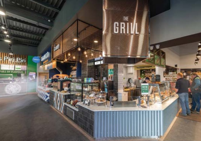 Copper-mesh The Grill feature and suspended ventilation at Centra Clarina