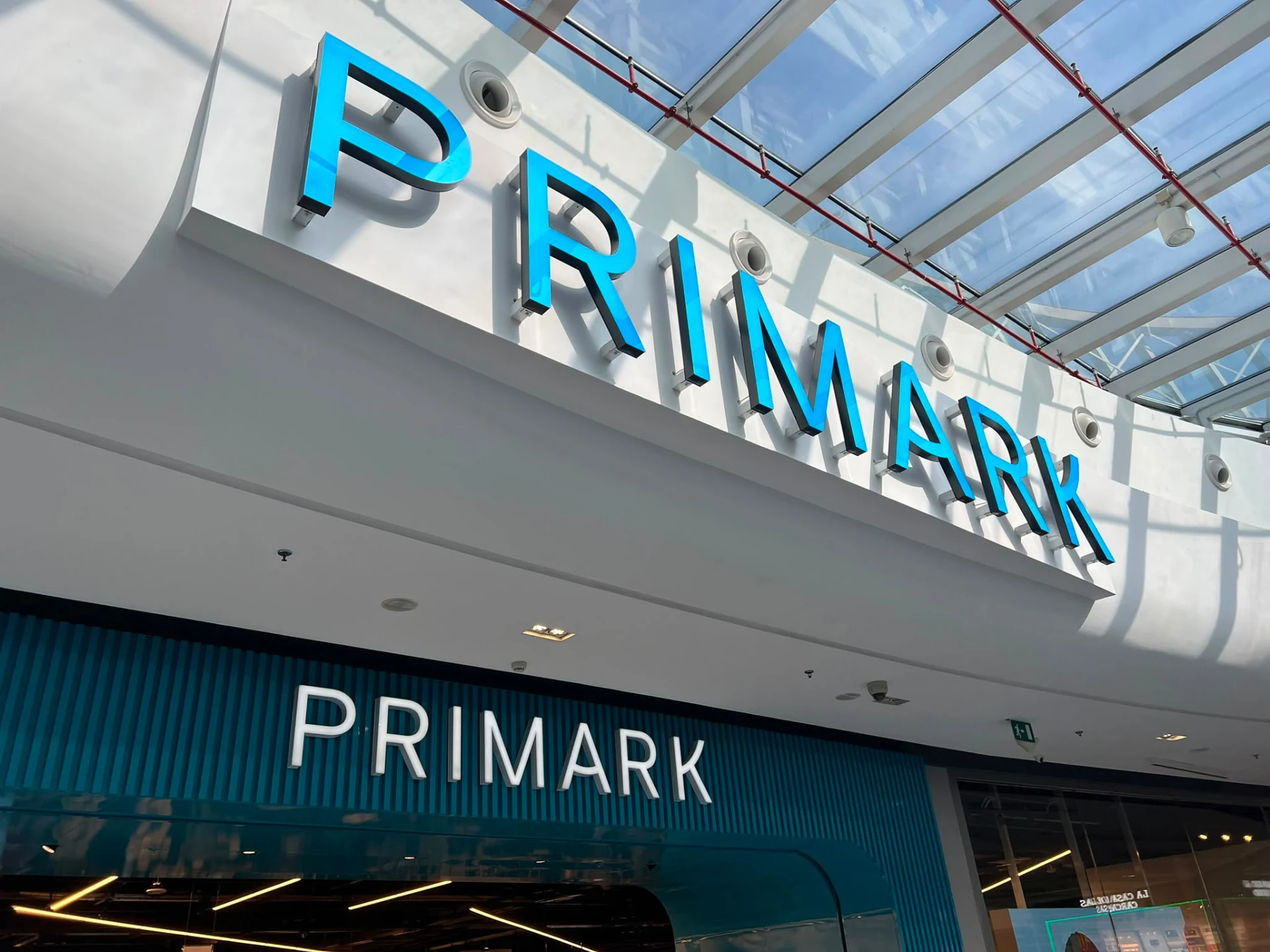 Close-up of the large Primark letters above the Pompeii store entrance