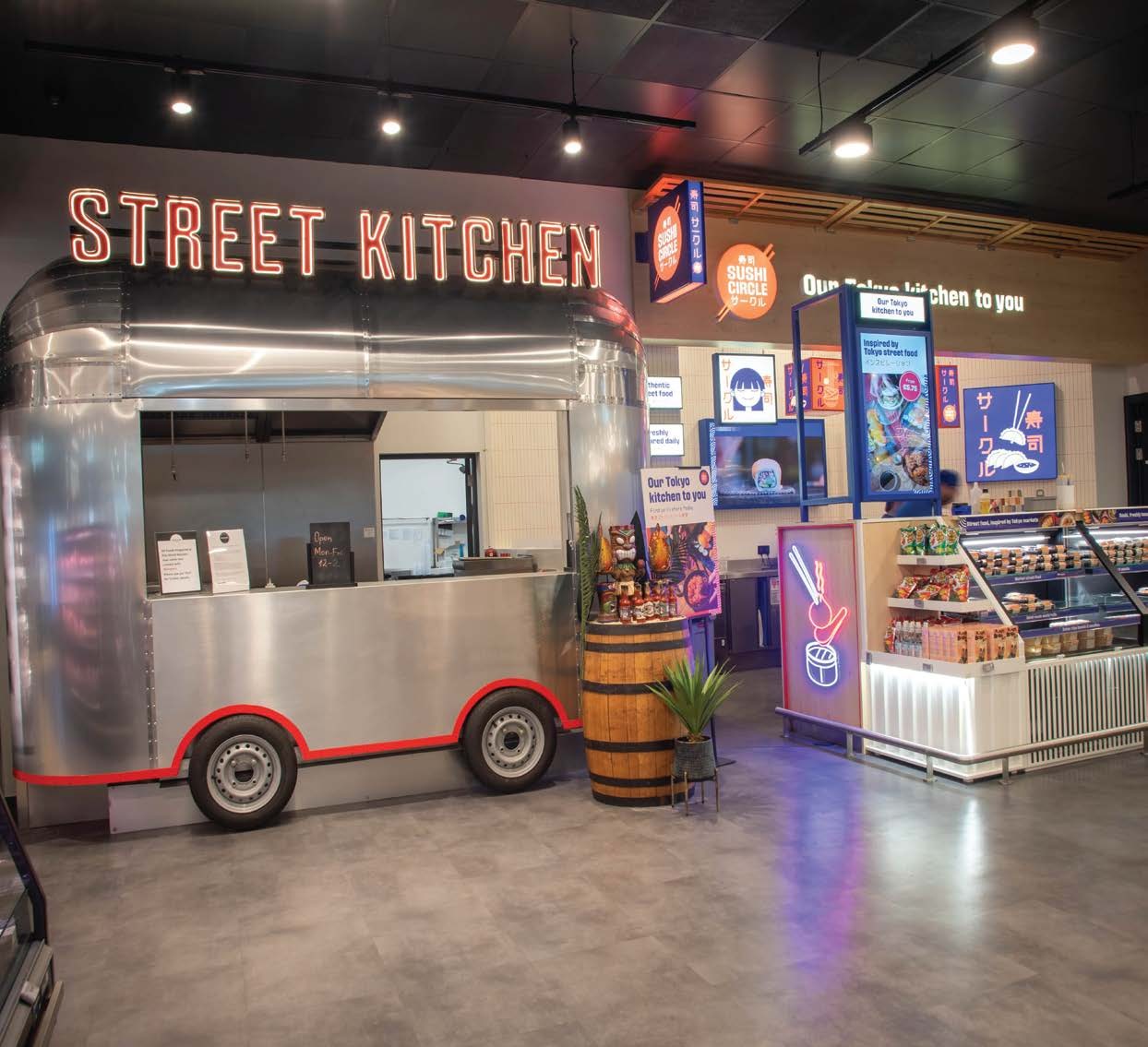 Custom stainless-steel Street Kitchen concession with illuminated signs at Scally’s Clonakilty